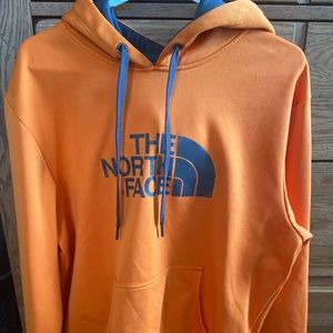 Men’s orange North Face hoodie